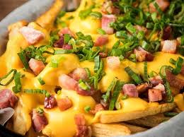 Papas  Fritas Cheddar,  Paceta y Verdeo